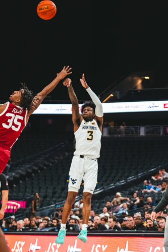 WVU Wins College Basketball Crown In Overtime